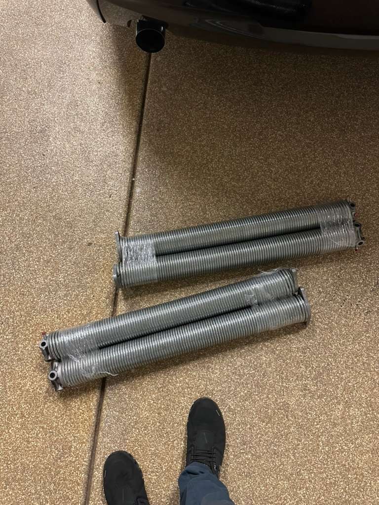 Garage door torsion springs and hardware